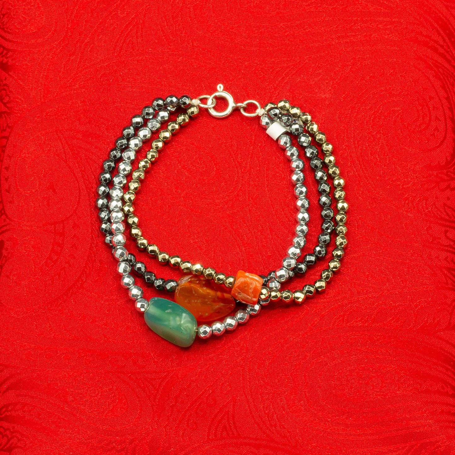 Bracciale in argento con 3 fili in ematite e pietre dure