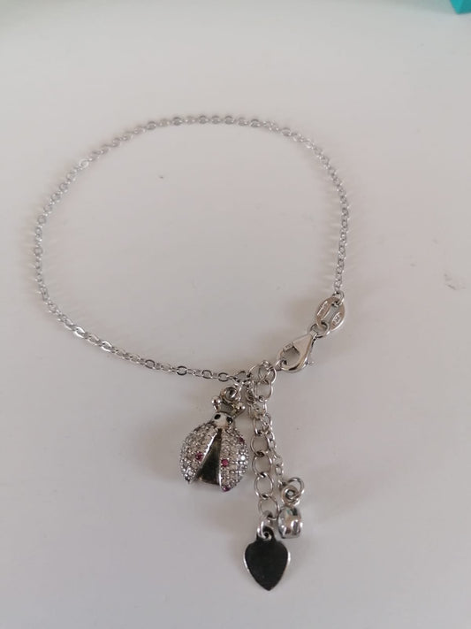 Silver bracelet with cherub medallion